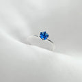 Anel Solitário 6 garras pedra azul